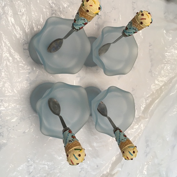 Other - Ice cream sundae set. 4 each frosted dishes and enhanced spoons. Enjoy the fun !